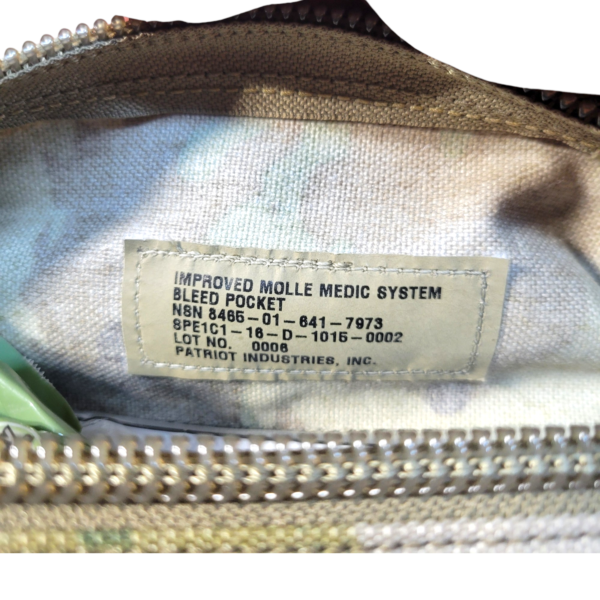 Improved MOLLE II bleed pocket by onethiefsurplus, tactical pouch with MOLLE compatibility for first aid supplies.