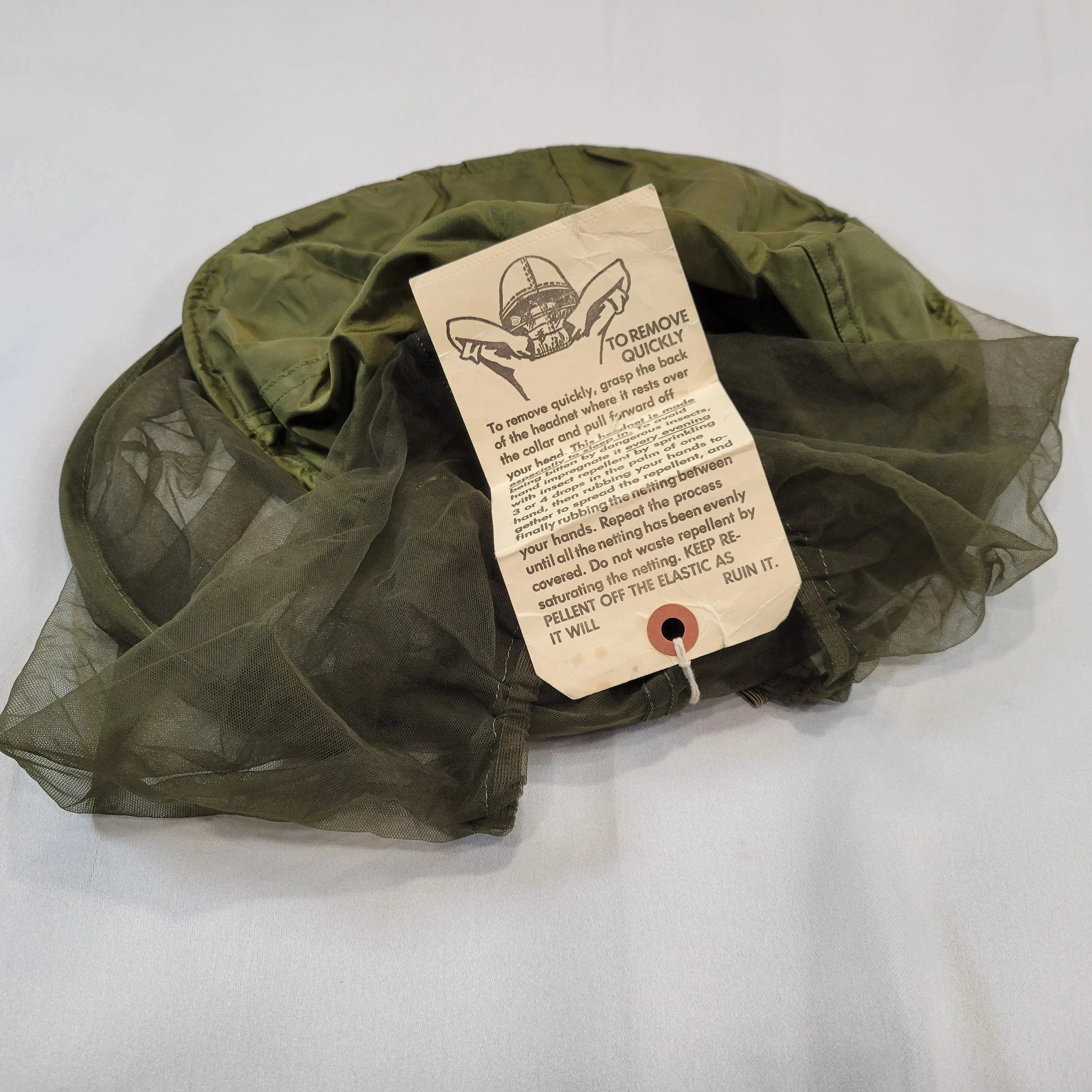 Onethiefsurplus mosquito head net for sporting outdoor activities, lightweight mesh protection against insects.