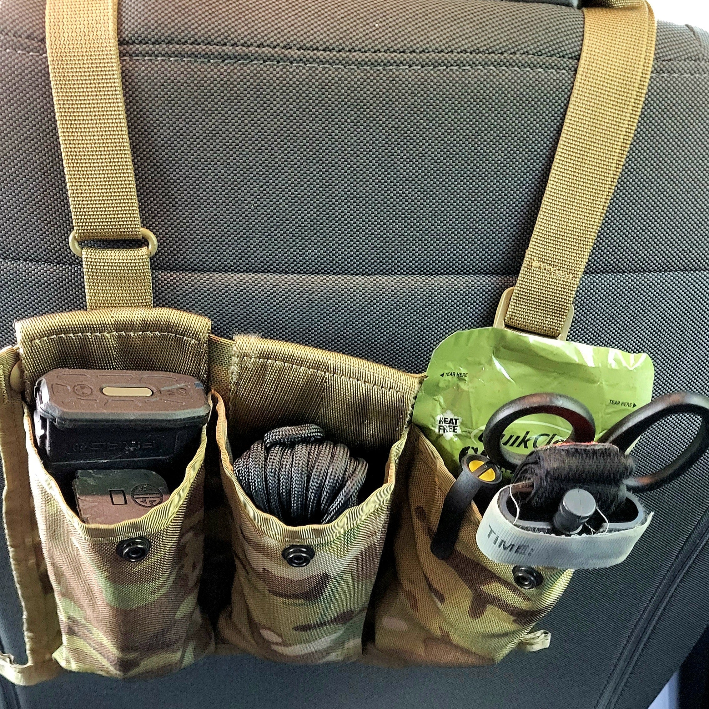 USGI bandoleer with various camouflage patterns, durable military-style ammo carrier from onethiefsurplus.