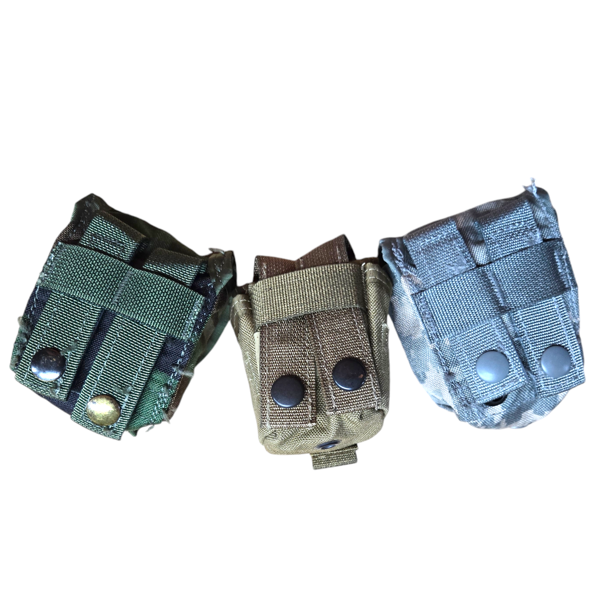 USGI M67 pouch for camping and hiking, showing various camouflage patterns, durable military-style storage accessory.