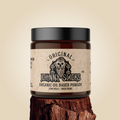Organic oil-based pomade by Johnny Slicks in a jar, showcasing its smooth, shiny consistency and natural ingredients.