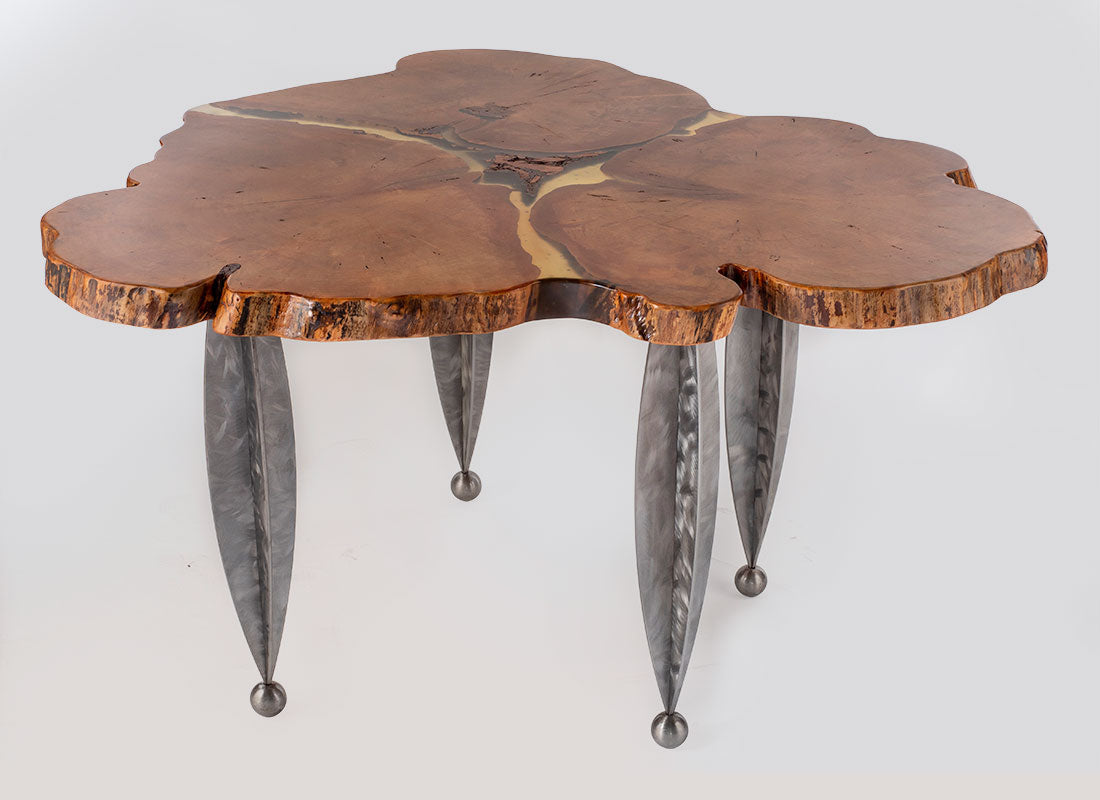 Enrico Bartolini 3 Heart Red Ambrosia Maple table with starfruit-shaped legs, showcasing a unique, decorative wooden design.