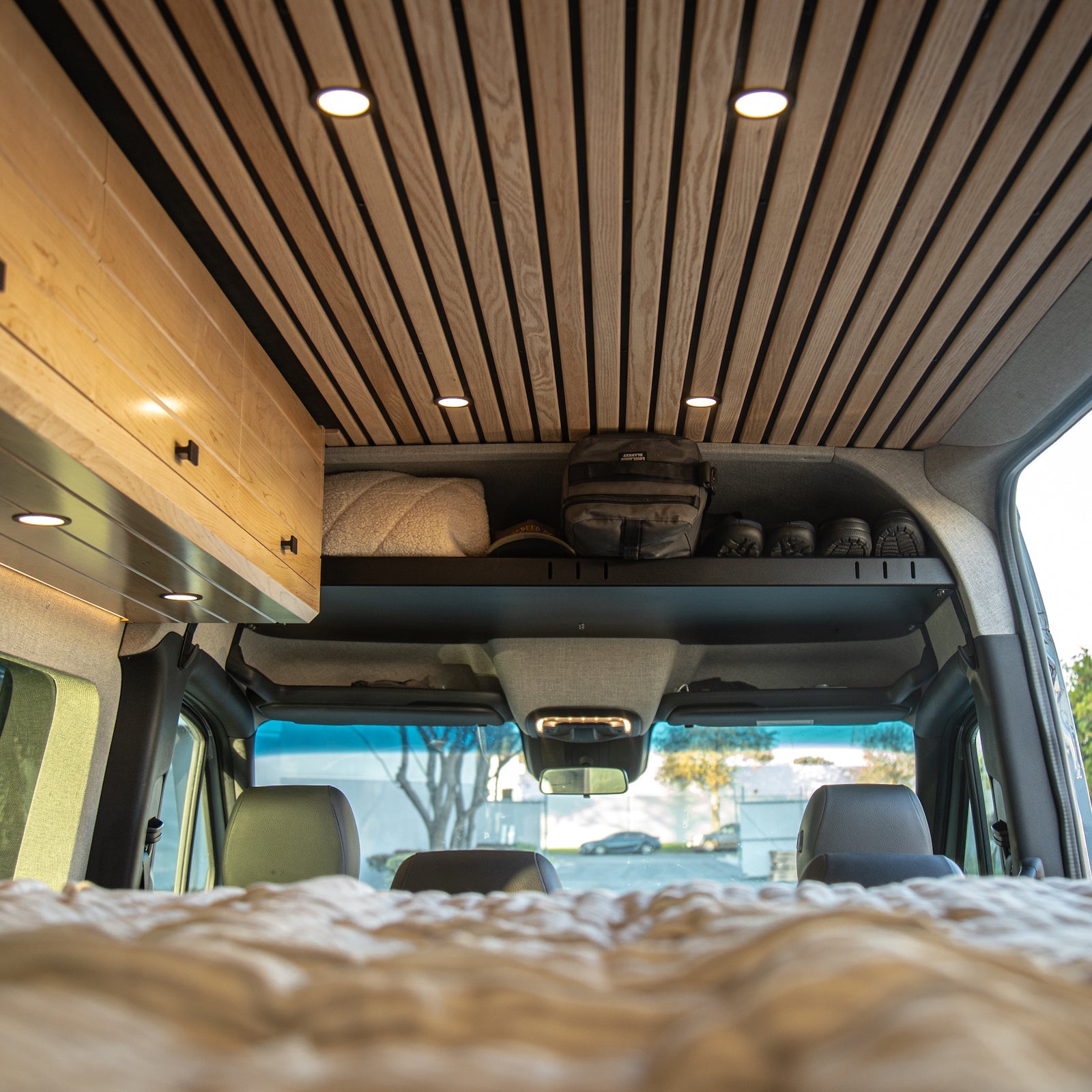 Sprinter headliner shelf from The Van Mart's VanSpeed DIY Collection, showcasing a sleek design for van storage solutions.