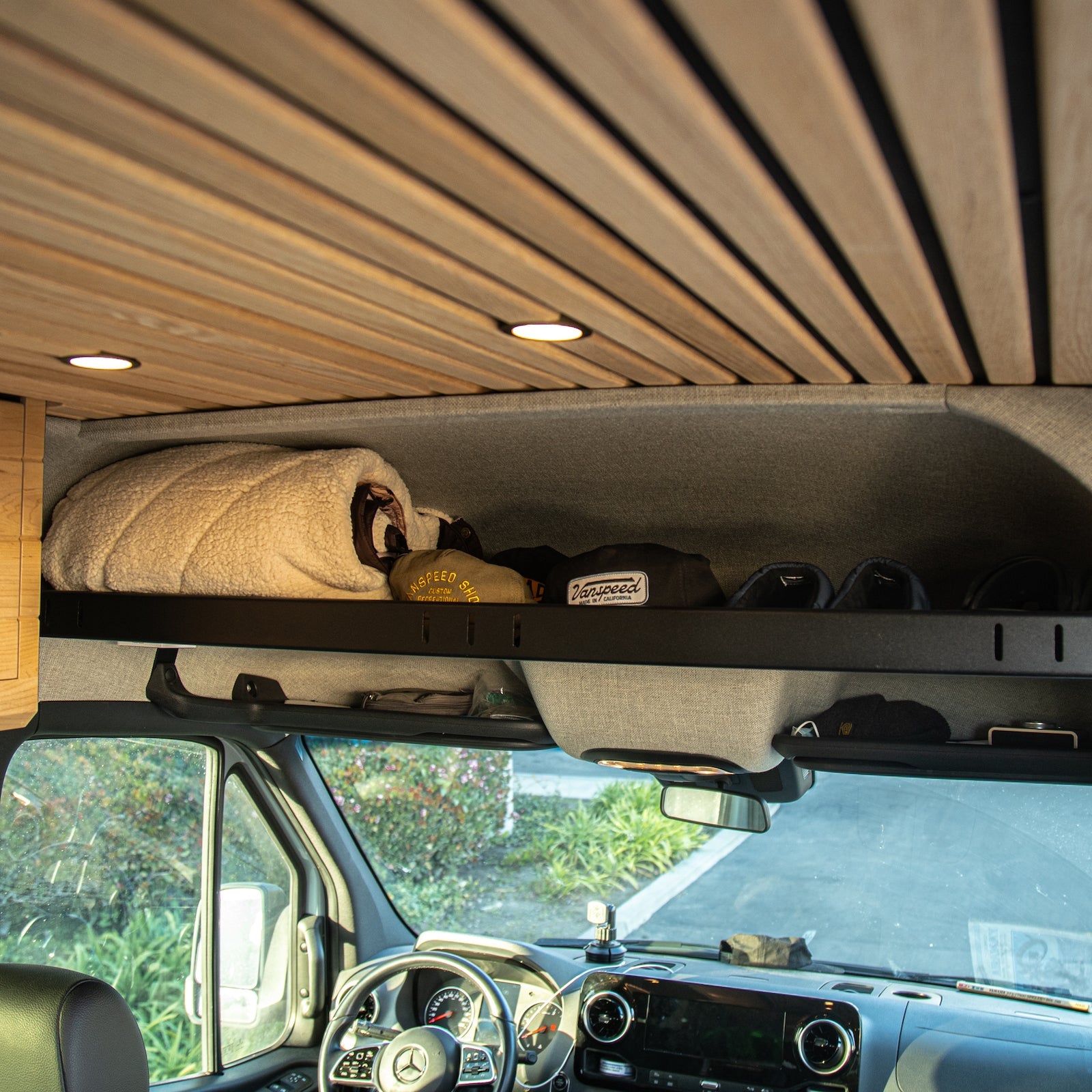 VanSpeed DIY Collection Sprinter Headliner Shelf by The Van Mart, showcasing a sleek design and functional storage.