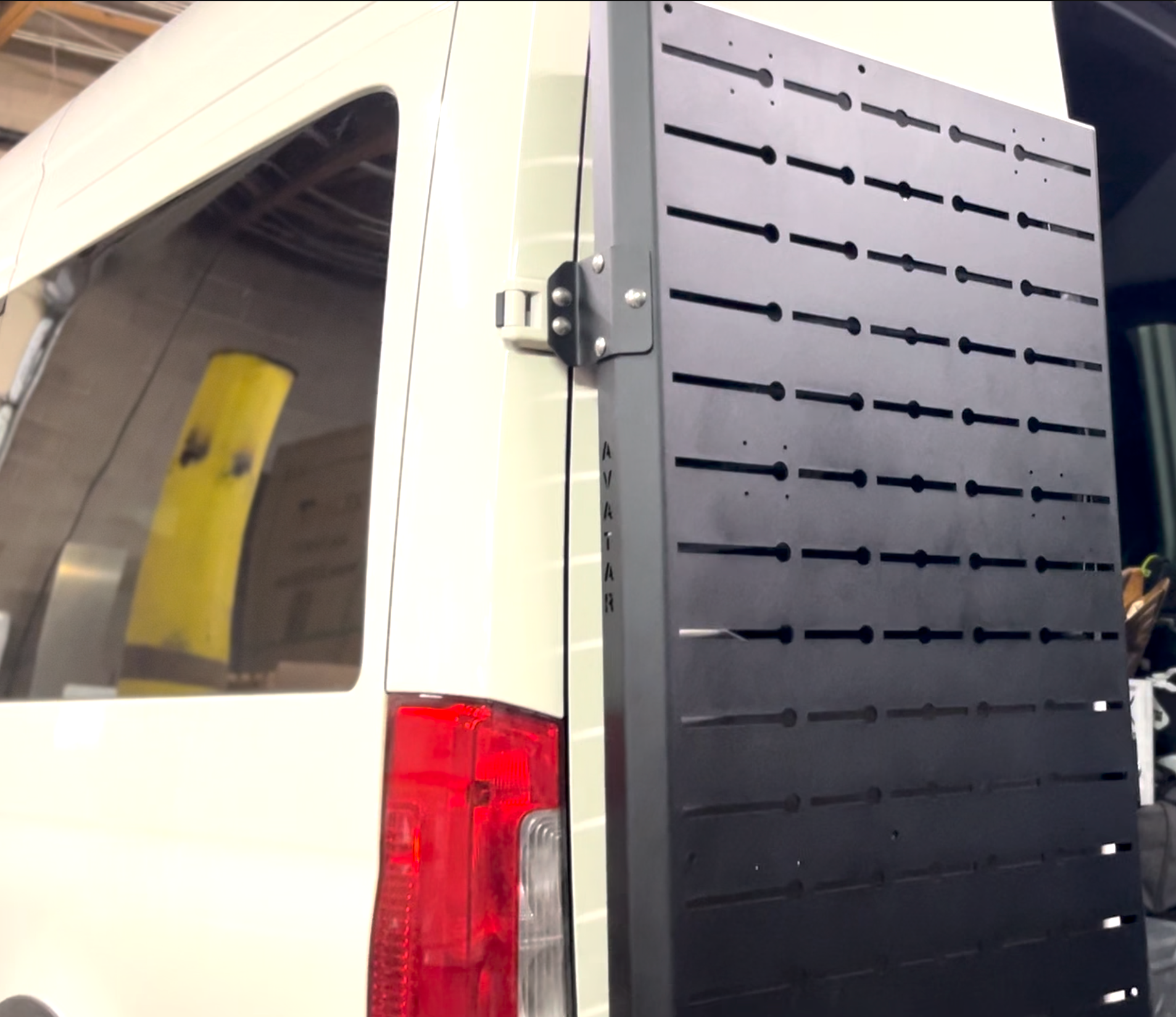 Avatar Offroad Packs-a-lot Storage Mount for Sprinter van, featuring a durable black mounting solution for secure cargo storage.
