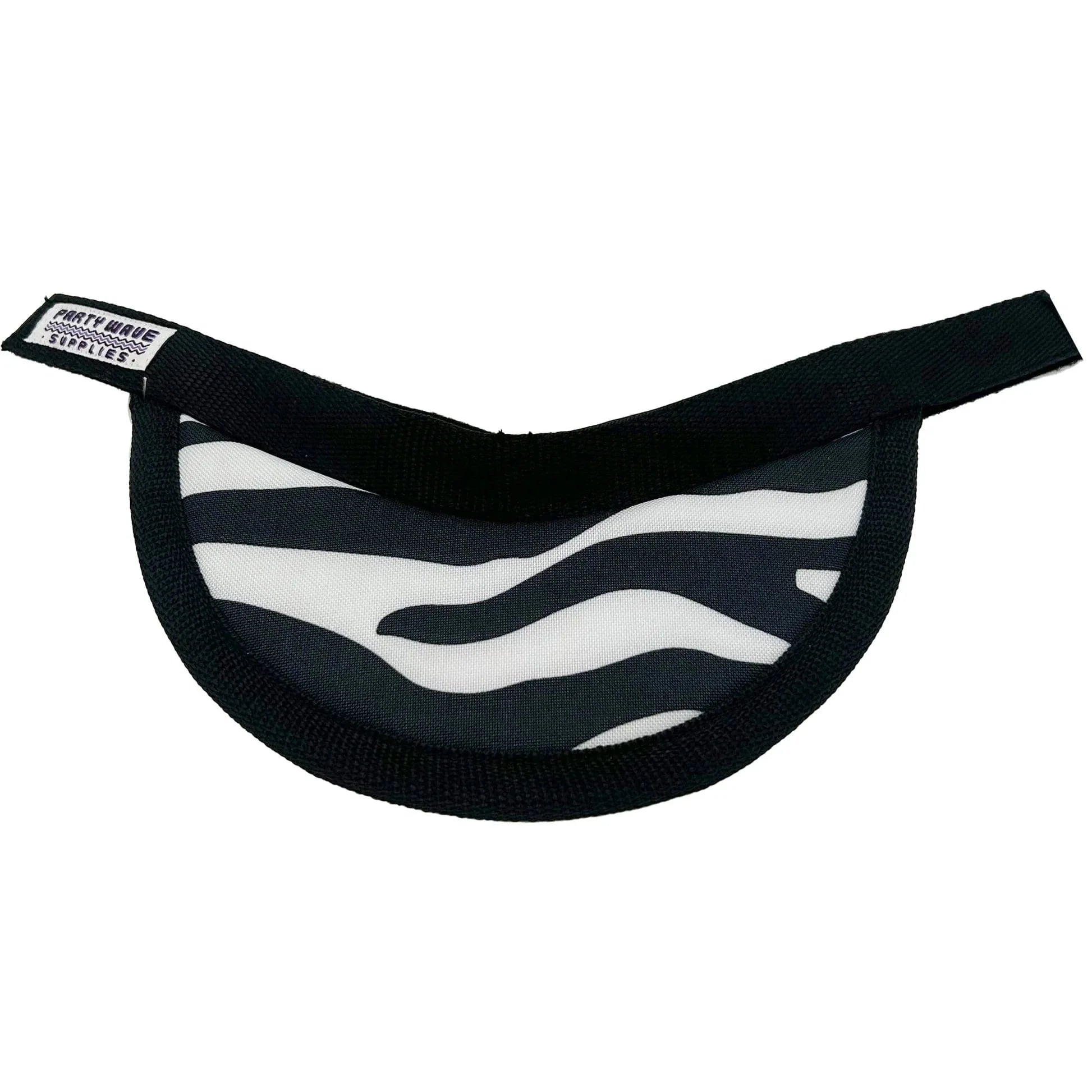 A black and white zebra-striped visor with a black ribbed fabric trim and a black elastic strap. A small white brand label on the left edge reads 'PORT WASHINGTON LICENSED TOYS'.