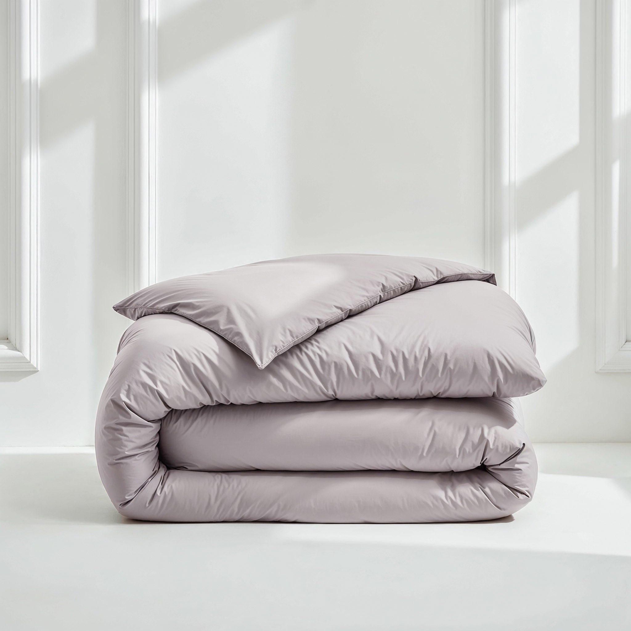 Pebble gray Luxe Australian Sateen duvet cover by Italic, soft and smooth bed linen for a luxurious bedroom look.