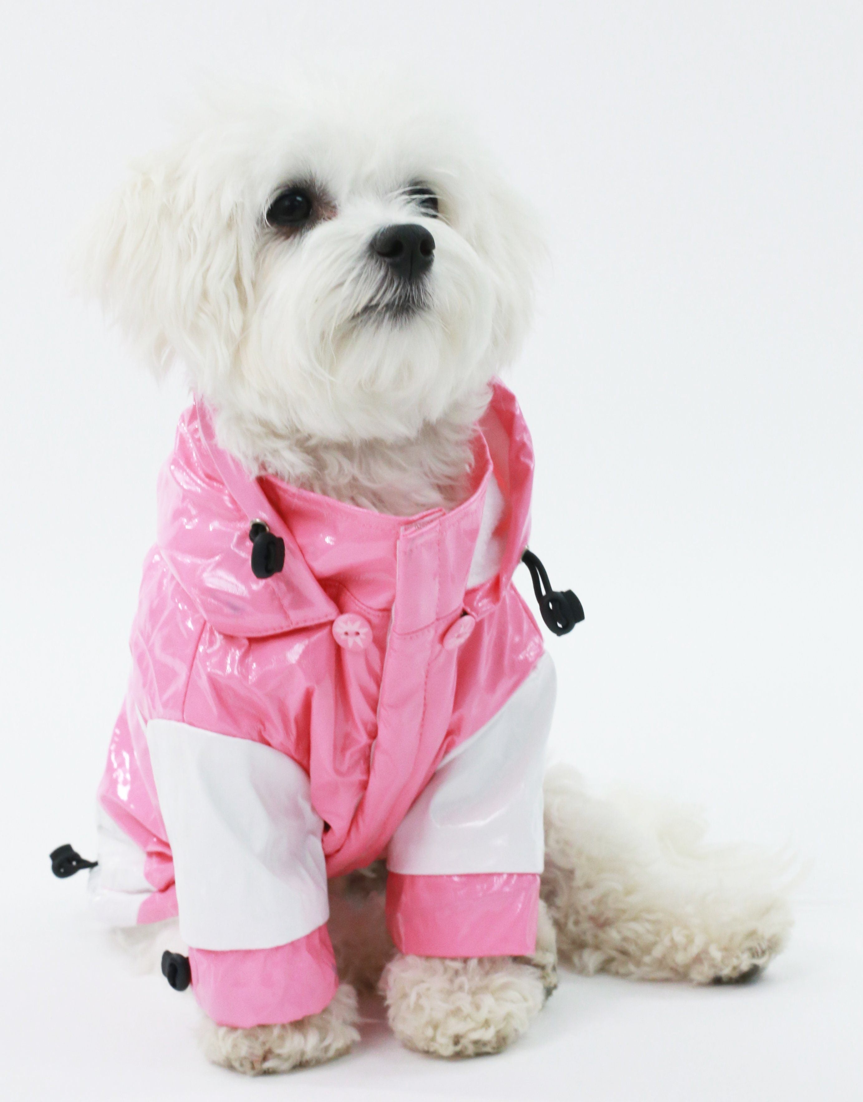 Pet Life waterproof two-tone adjustable dog raincoat with removable hood, designed for outdoor protection and comfort.
