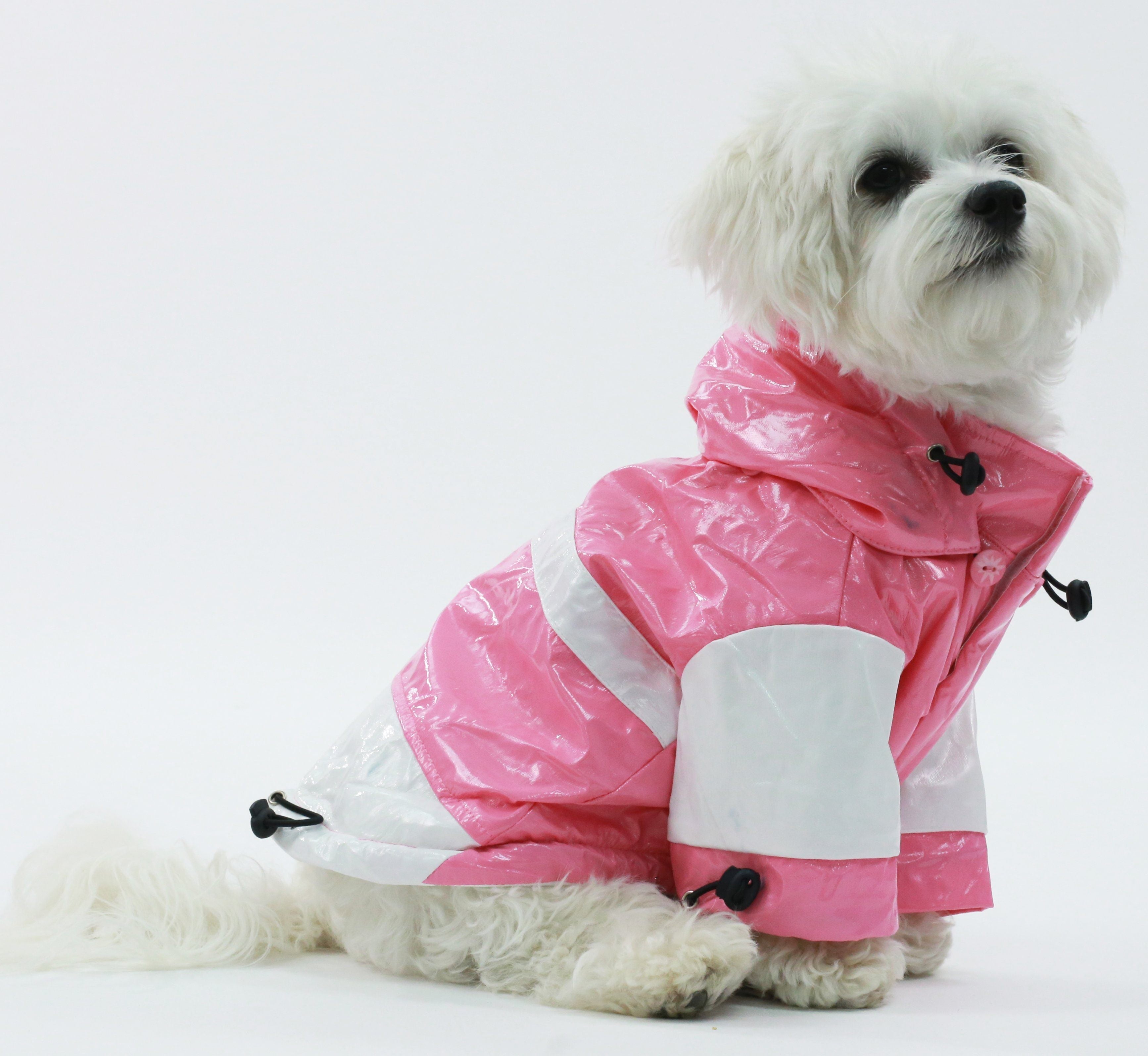 Pet Life Two-Tone waterproof adjustable dog raincoat jacket with removable hood, designed for outdoor protection and comfort.