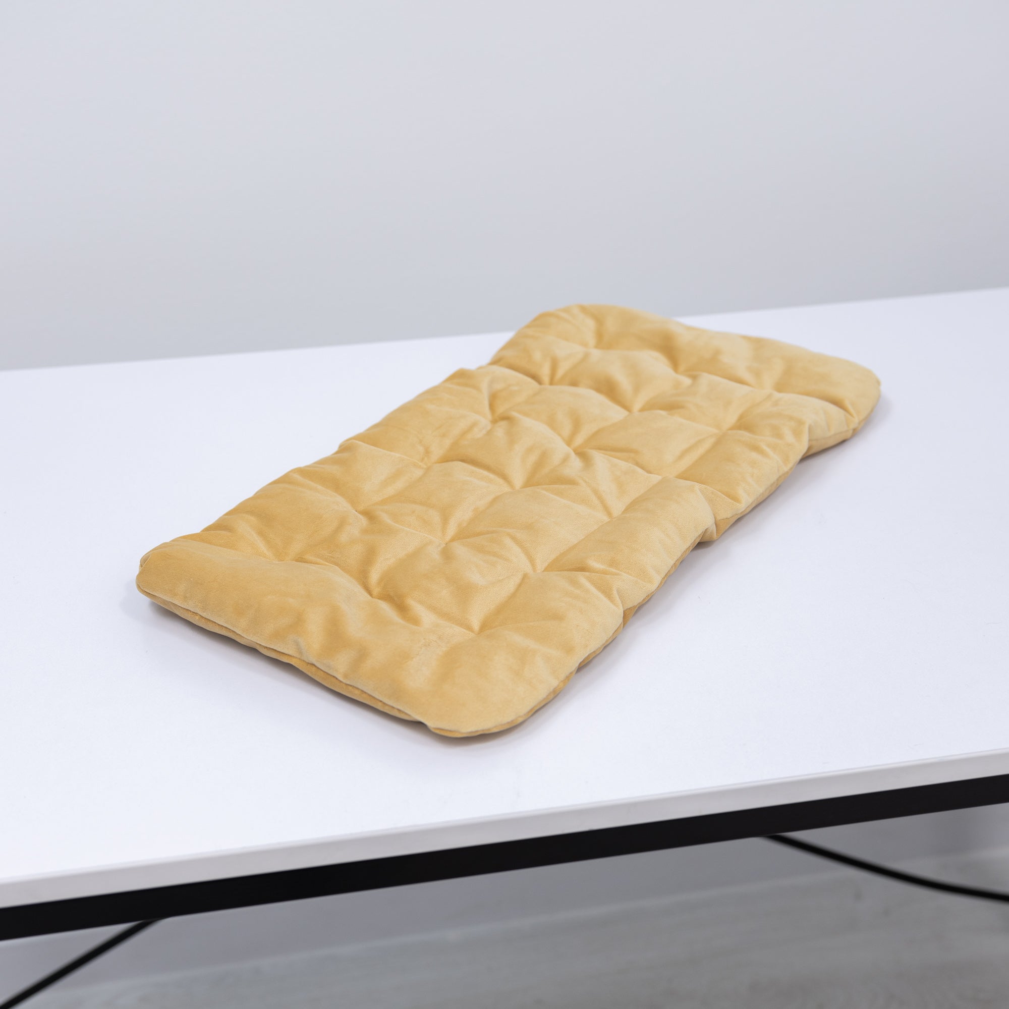 Yellow sleeping cat-shaped pillow by Enjoy The Wood, soft bed cushion with detailed feline design for cozy comfort.