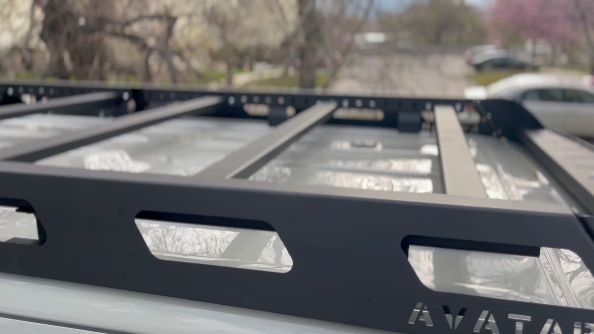 Avatar Offroad Pioneer Sprinter roof rack mounted on a vehicle, providing extra cargo space and durability for outdoor adventures.