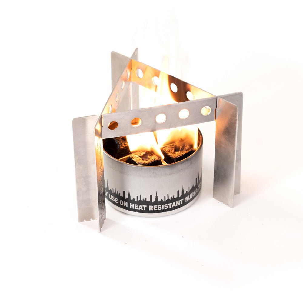 Portable Camp Stove by City Bonfires with stand, showcasing a compact design ideal for outdoor cooking.