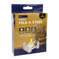 Portable metal camping stove with fuel tablets for cooking food and boiling water during outdoor adventures.