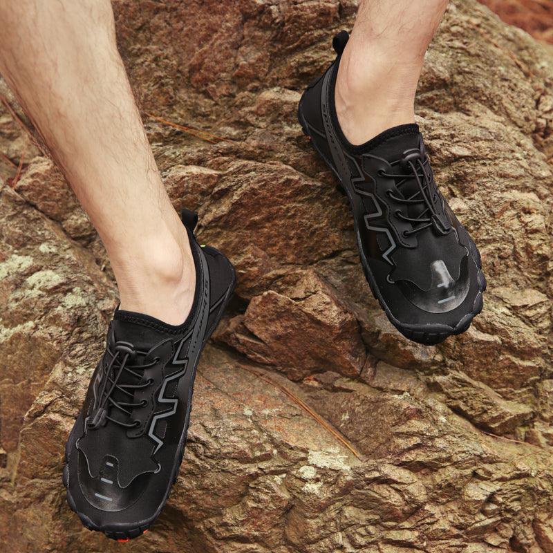 Stevvex unisex upstream swimming water shoes on a sandy beach, designed for barefoot outdoor water activities.
