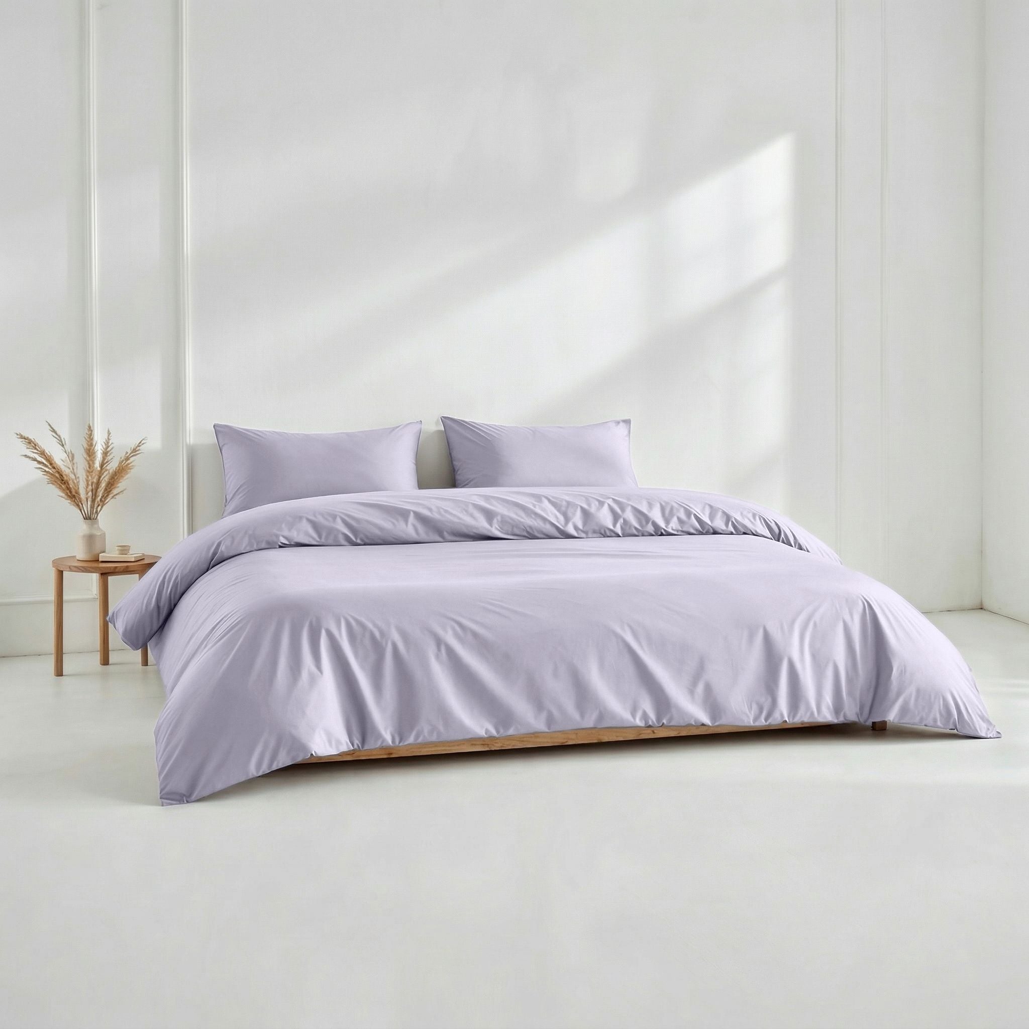 Luxurious Australian sateen duvet cover by Italic in a sleek, smooth fabric with a subtle sheen, styled on a neatly made bed.