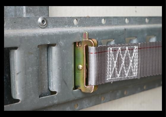 Set of 10 RatchetStrap.Com 2x16 ft. logistic van E-track straps with spring fittings, ideal for securing cargo inside vans.