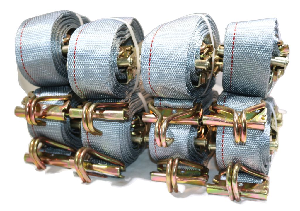 Eight 2-inch x 16-foot RatchetStrap.Com van ratchet straps with E-Track fittings, spring fittings, and wire J-hooks for interior logistics.