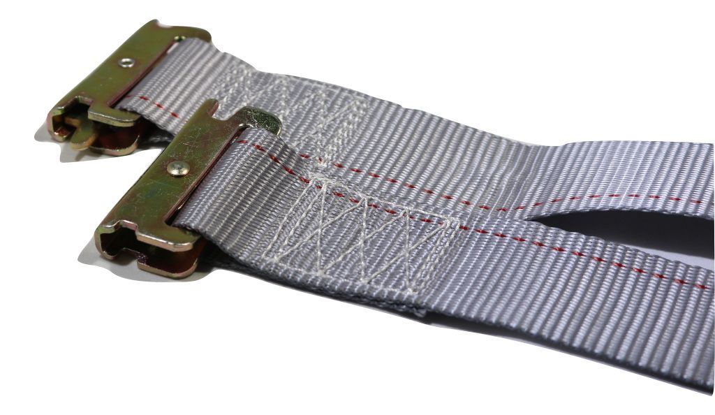 Set of eight 2x16 ft RatchetStrap.Com logistic van E-track straps with spring fittings for secure interior cargo fastening.