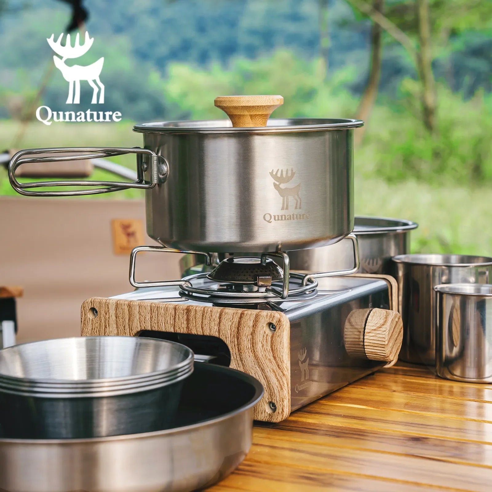 Qunature Global 304 stainless steel 5-piece camping cookware set with Teflon coating, including pots, pans, and utensils for outdoor cooking.