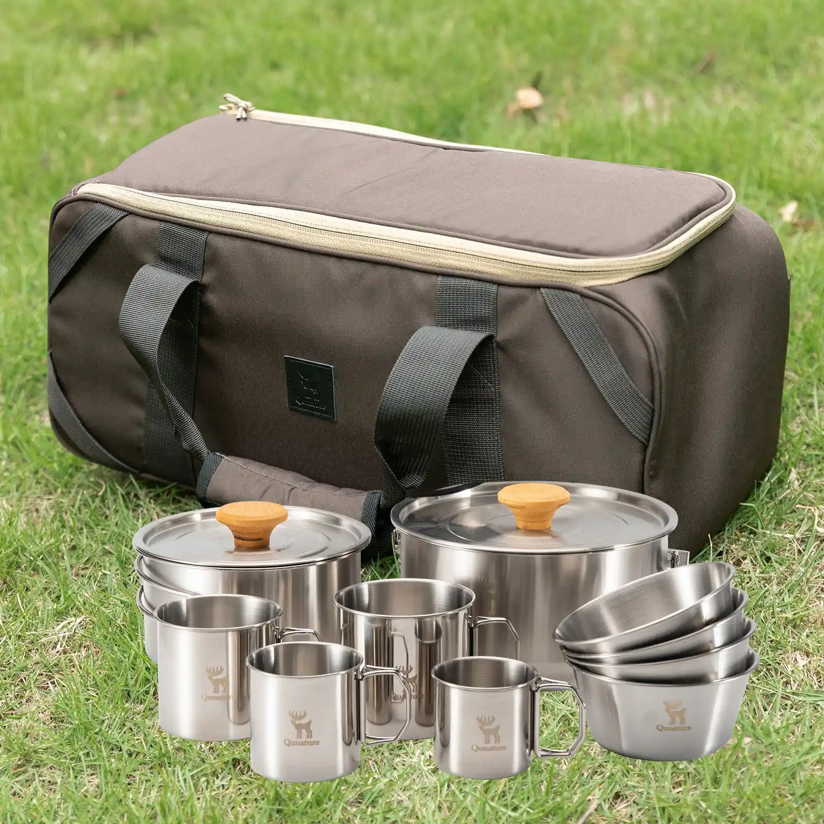 Qunature Global multi-compartment camping tableware carry bag showing organized mess kit with utensils and plates inside.