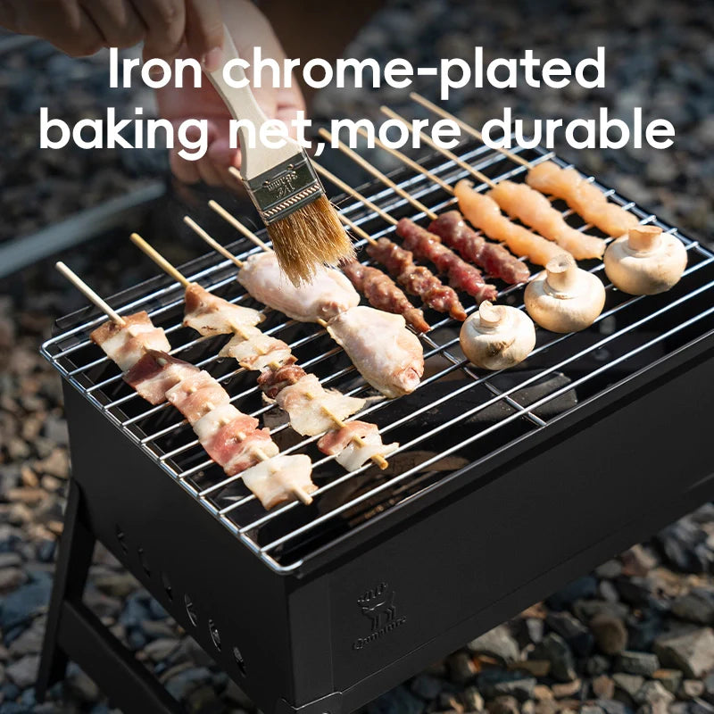Foldable Qunature Global BBQ grill stove with durable chrome-plated net and ventilation system, ideal for outdoor grilling.