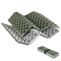 Lightweight Qunature Global folding seat pad mat with foam, ideal for hiking and camping, shown outdoors in a natural setting.