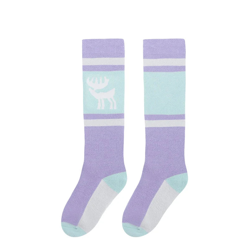 Kids ski socks by Qunature Global, knee-high wool blend thermal snowboarding and skating socks for boys and girls, warm and cozy.