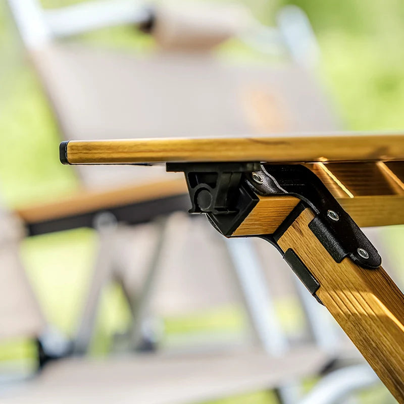 Qunature Global lightweight foldable aluminum table with a sleek design, perfect for portable use and easy storage.