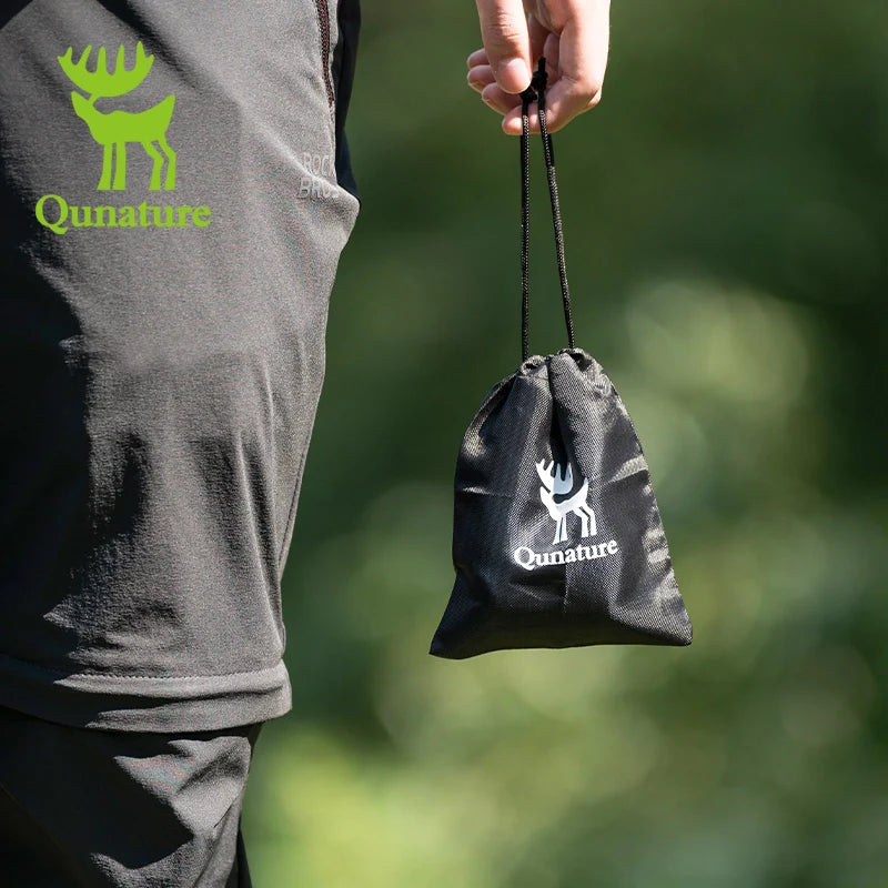 Mini electric rechargeable air pump by Qunature Global, designed for inflatables with a compact and portable design.