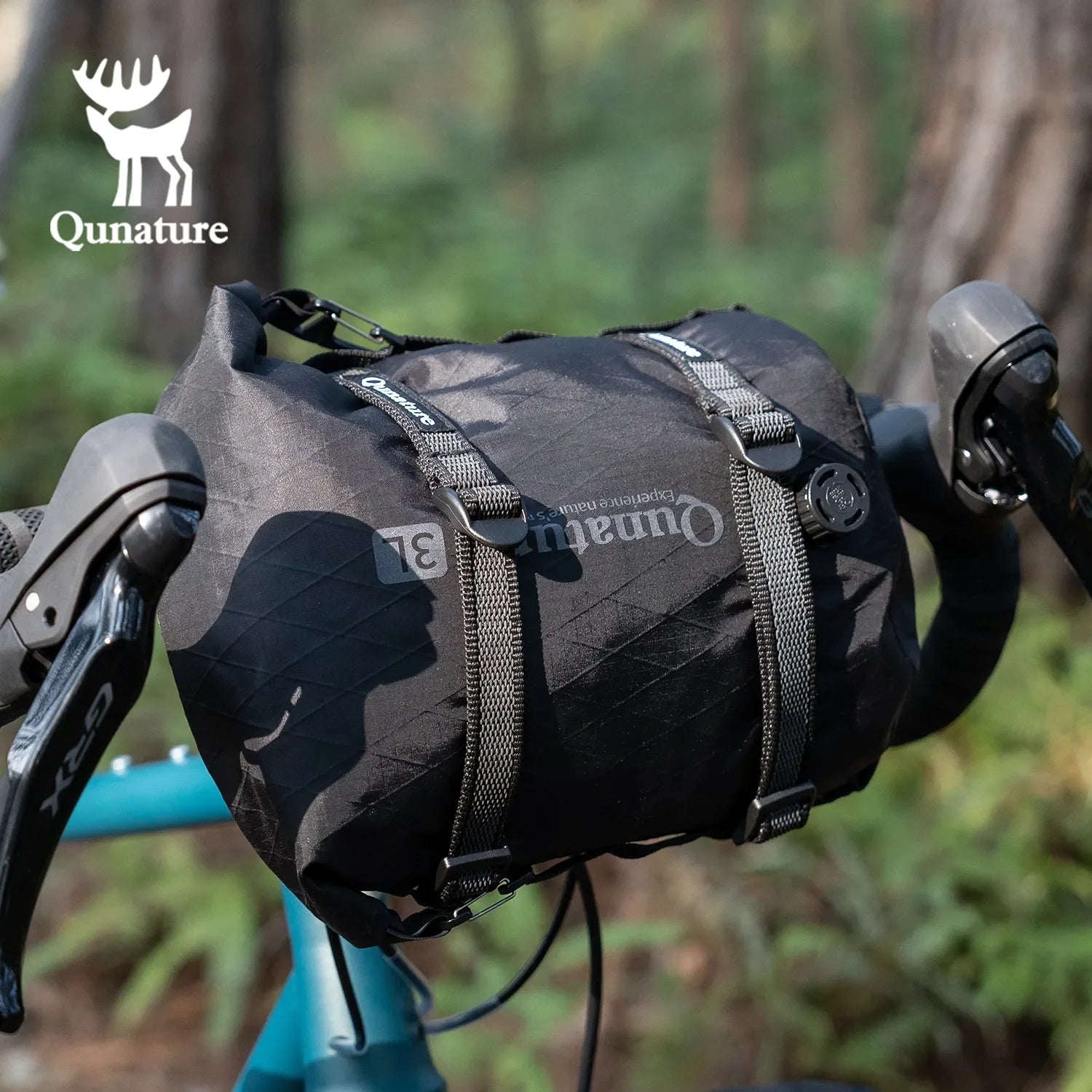Two adjustable Qunature Global cargo binding straps for bikepacking, designed for secure multi-purpose bike cargo tying.