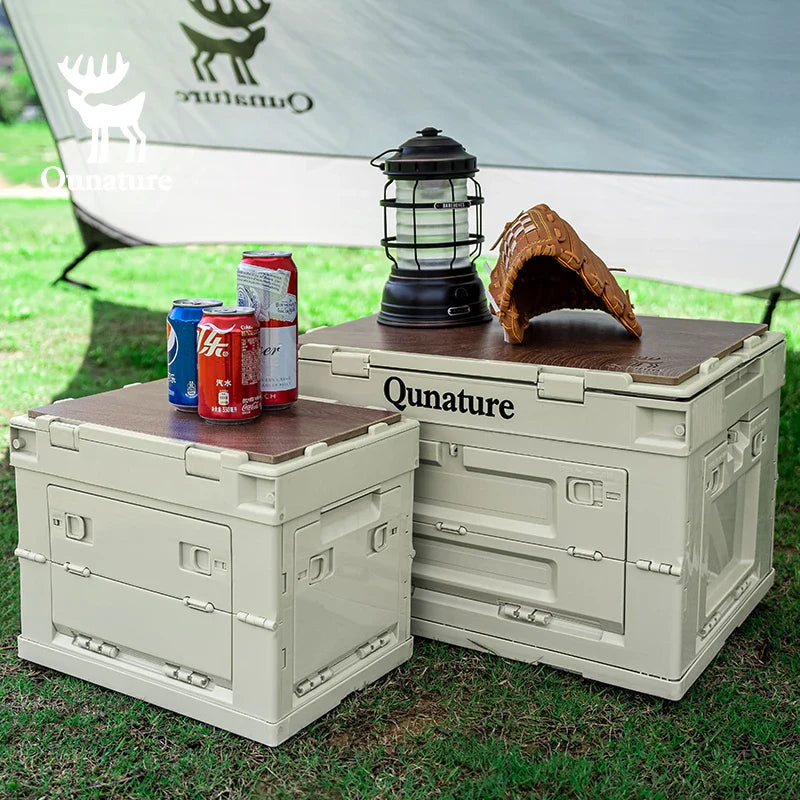 60L and 26L Qunature Global multi-door folding storage boxes with a tabletop, showcasing a practical outdoor storage solution.