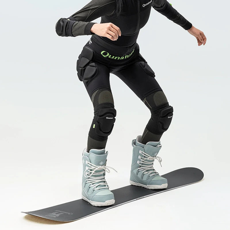 Qunature Global protective knee pads with thick sponge and anti-slip design for impact protection while skiing.