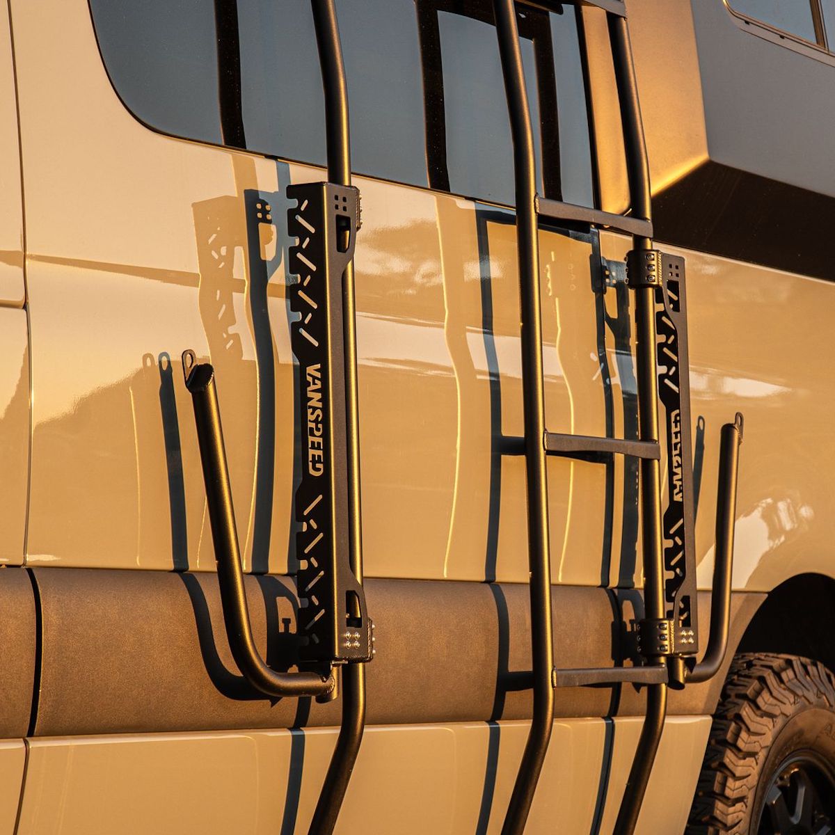 Sprinter Exterior Surf Rack Set by The Van Mart installed on a van, showcasing sturdy rails for surfboard storage.
