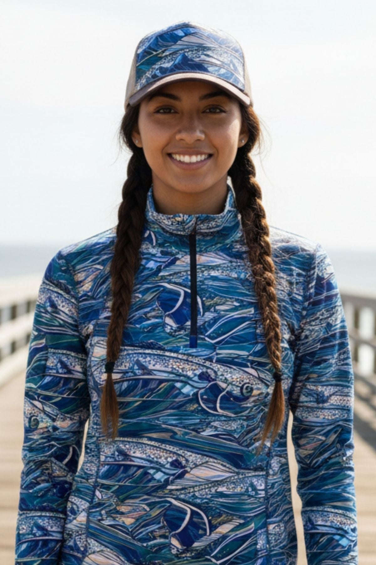 Colorful Rainbow Ridge abstract trucker hat by FisheWear featuring vibrant geometric patterns and a curved brim.