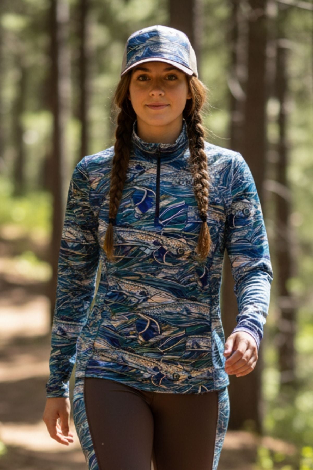 Colorful Rainbow Ridge abstract trucker hat by FisheWear featuring vibrant patterns and mesh back for casual style.