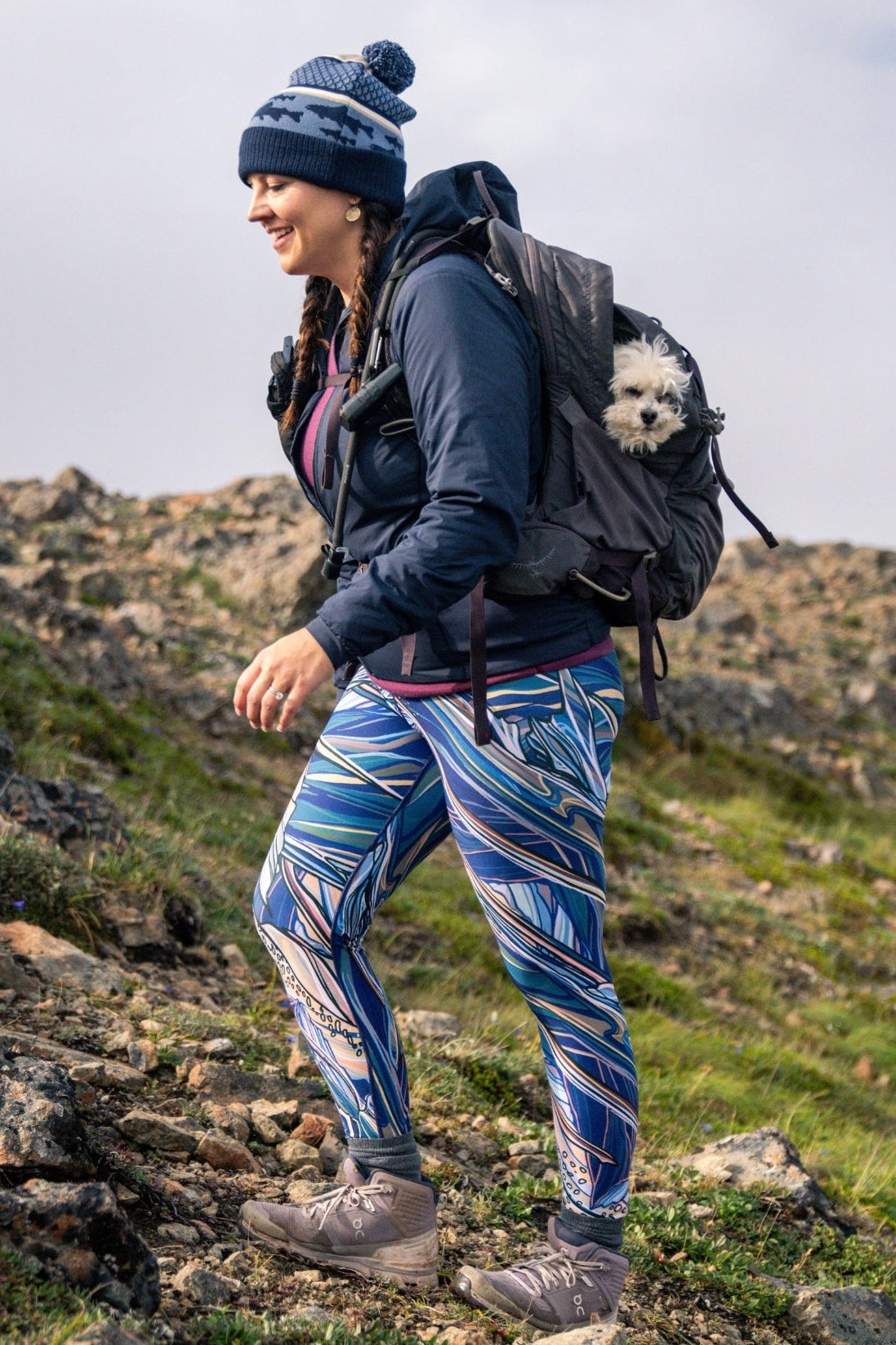 FisheWear Rainbow Ridge high-waisted leggings with colorful rainbow stripe pattern and comfortable fit, shown on a model.