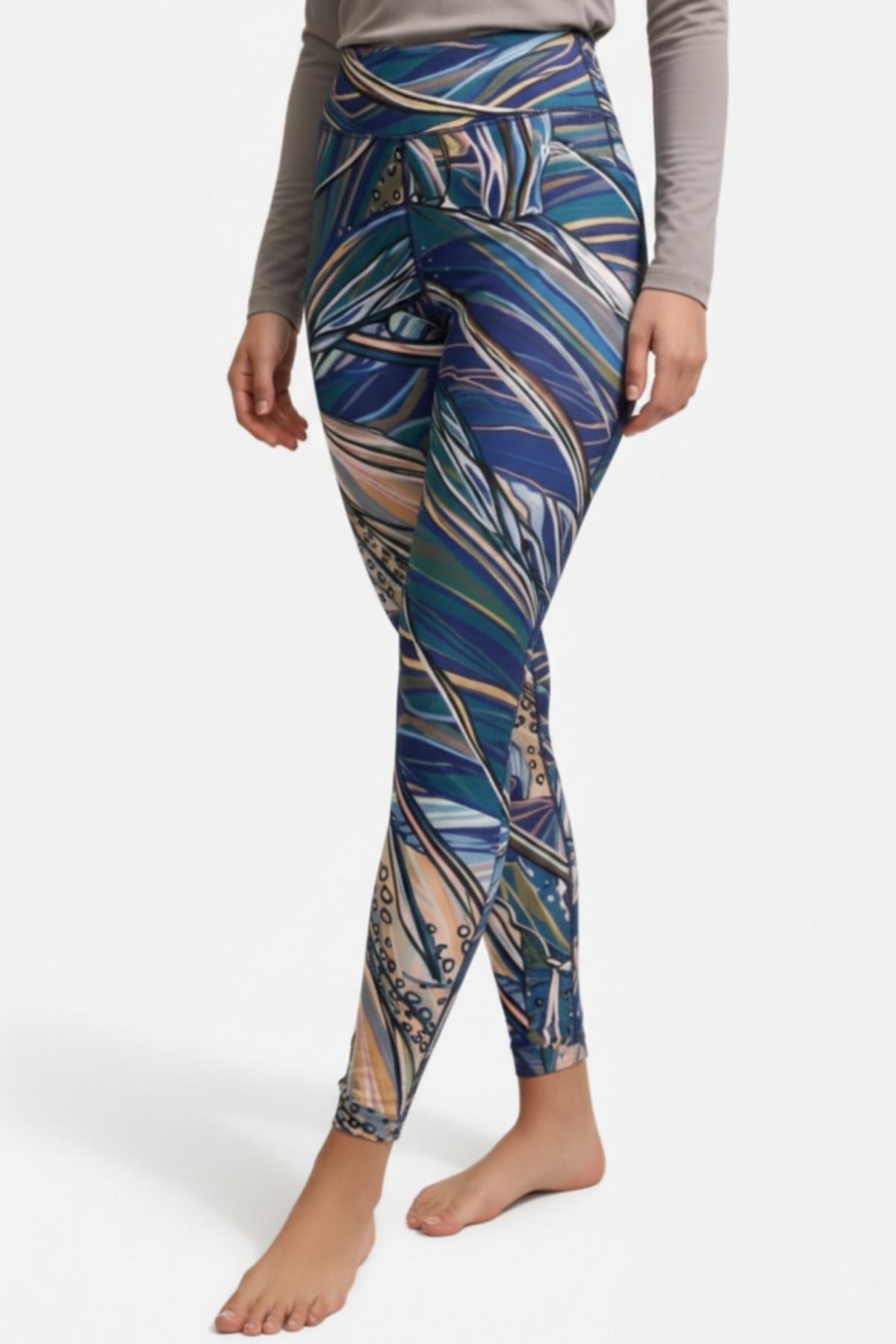FisheWear Rainbow Ridge high-waisted leggings with colorful rainbow pattern, stretchy fabric, and comfortable fit.
