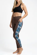 FisheWear Rainbow Ridge Pocket Leggings with colorful rainbow mountain pattern, stretchy fabric, and side pockets for active wear.