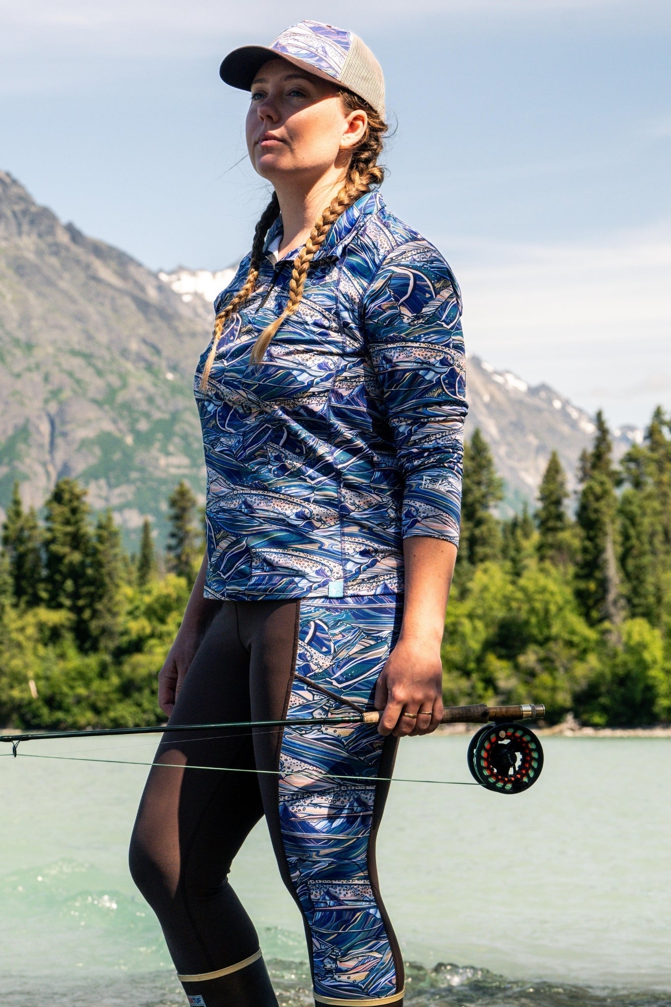 FisheWear Rainbow Ridge Thermal 1/4 Zip Top in vibrant rainbow colors, made from cozy thermal fabric for outdoor wear