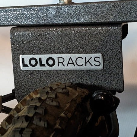 Lolo Racks DIY bike rack accessory showing a single rear tire mount for bicycle storage or transport.