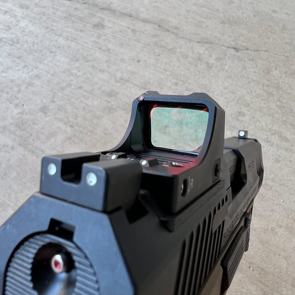 Red Dots Regulator Mini by SFT2 Tactical, compact red dot sight for tactical and shooting applications.
