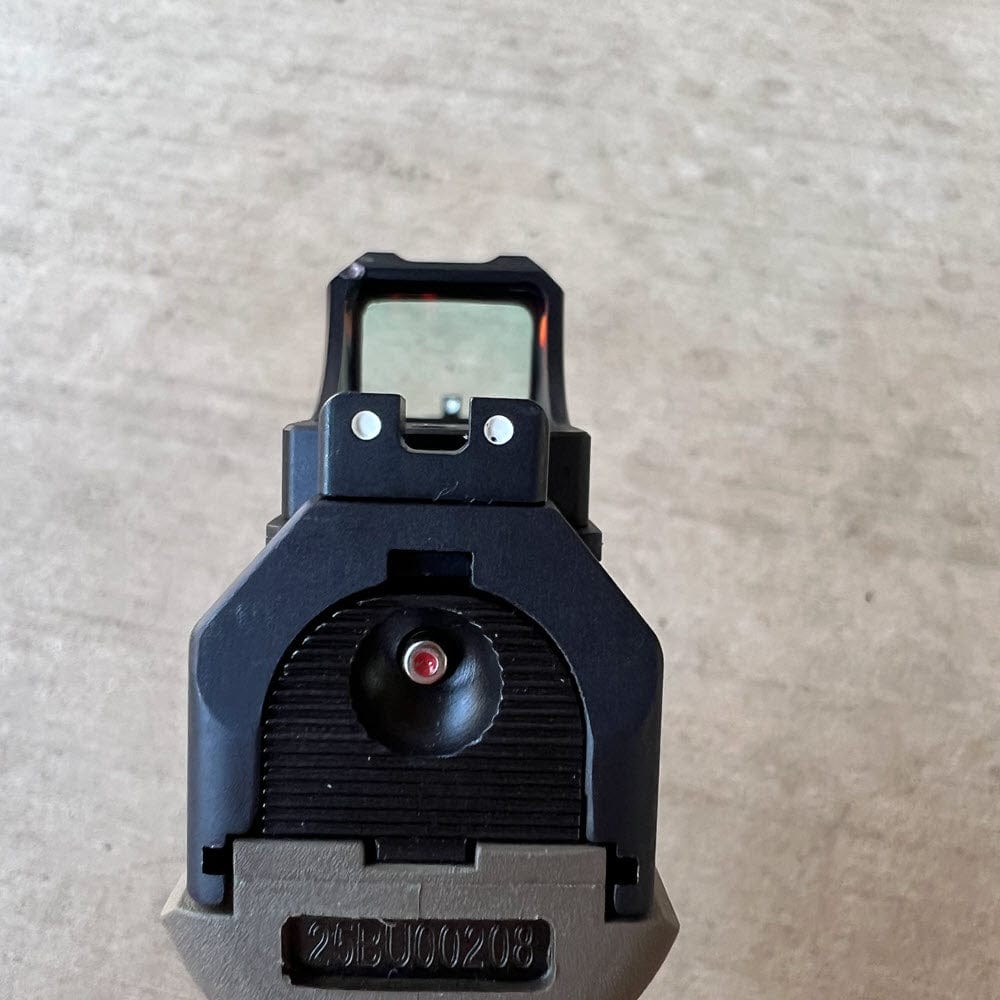 SFT2 Tactical Regulator Mini red dot sight mounted on firearm for quick target acquisition.