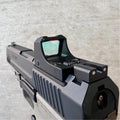 Red Dots Regulator Mini sight by SFT2 Tactical, featuring compact design and adjustable red dot for tactical use.