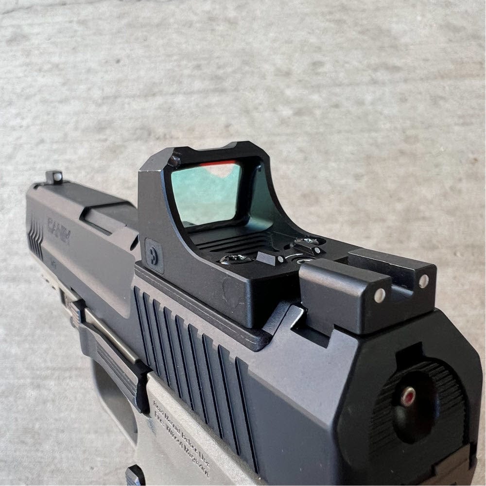 Red Dots Regulator Mini sight by SFT2 Tactical, featuring compact design and adjustable red dot for tactical use.