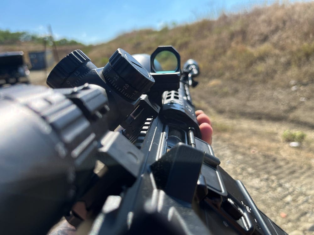 SFT2 Tactical Regulator MRS red dot sight on a rifle, showcasing its sleek design and adjustable features.