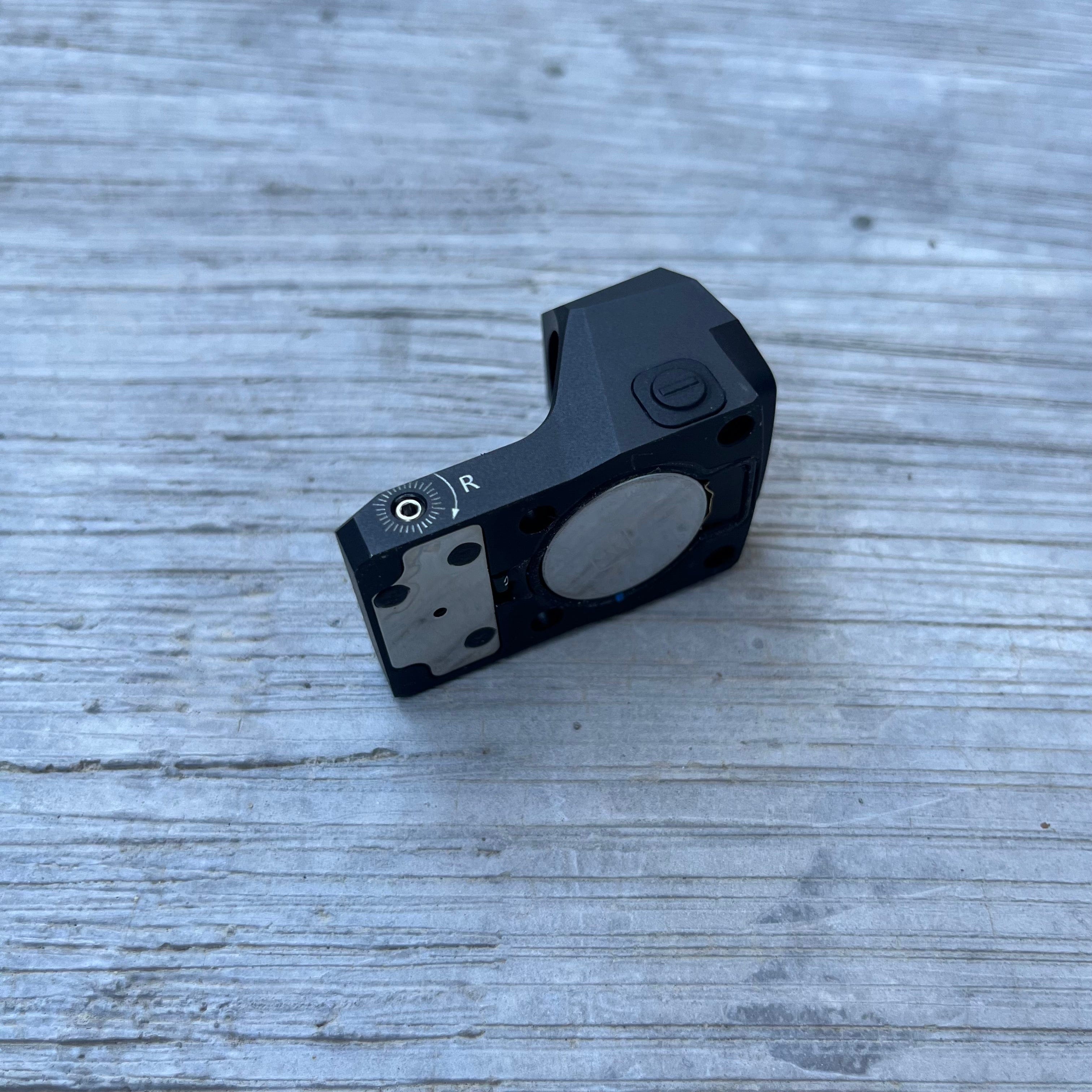 SFT2 Tactical Regulator MRS red dot sight, showcasing sleek design and adjustable features for precision aiming.
