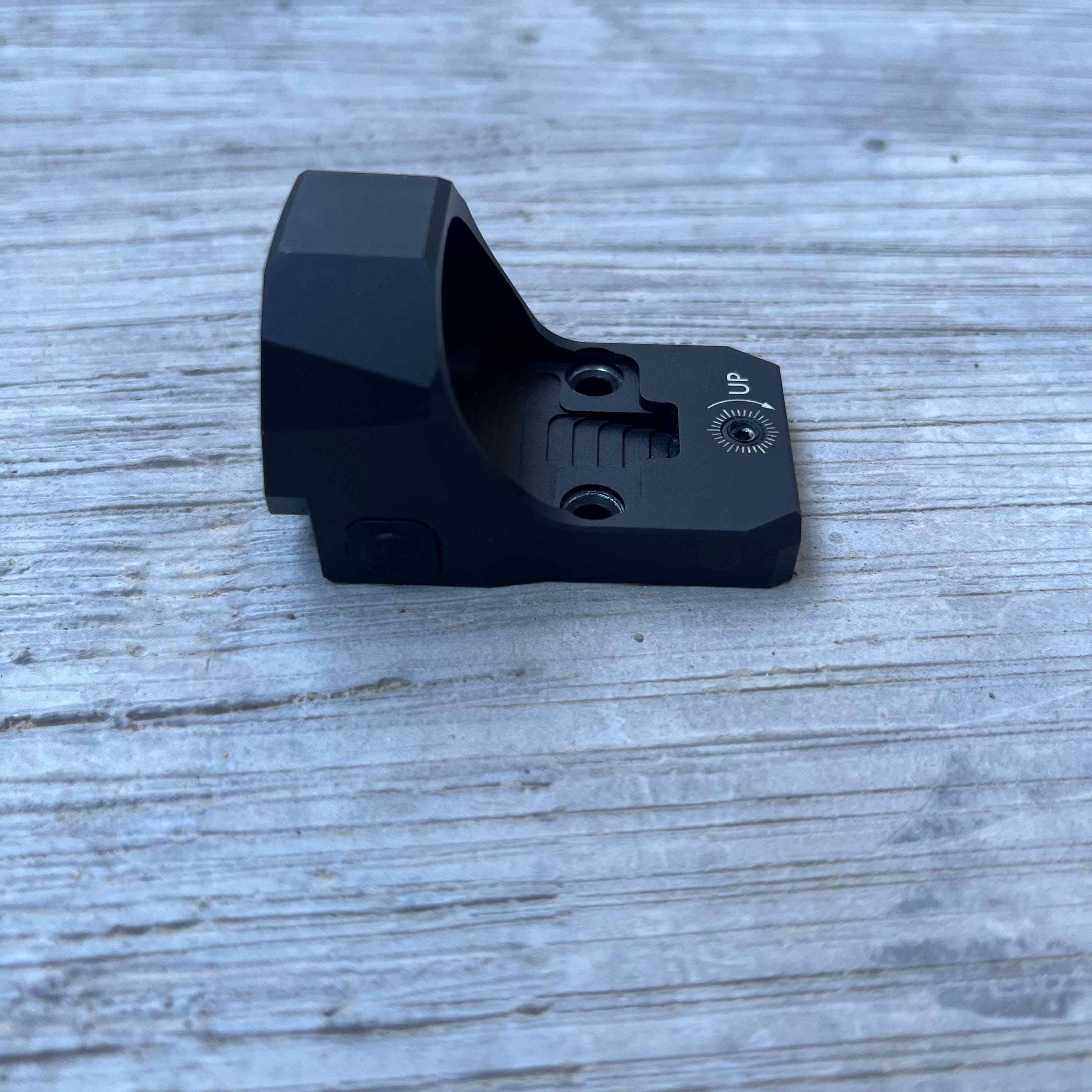 SFT2 Tactical Regulator MRS red dot sight on a rifle, showcasing its compact design and clear optics.