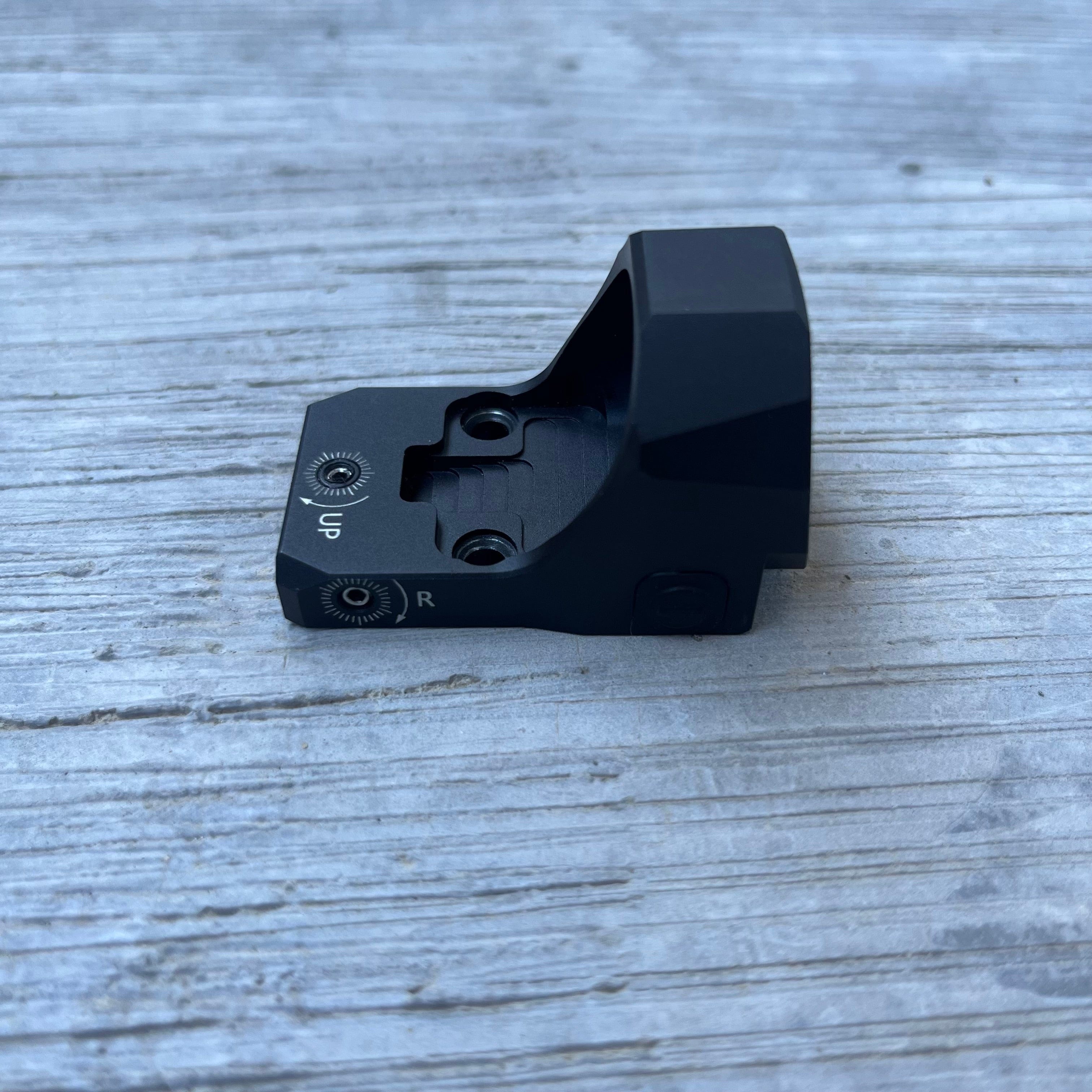 SFT2 Tactical Regulator MRS red dot sight with adjustable settings and a sleek design for precision aiming.