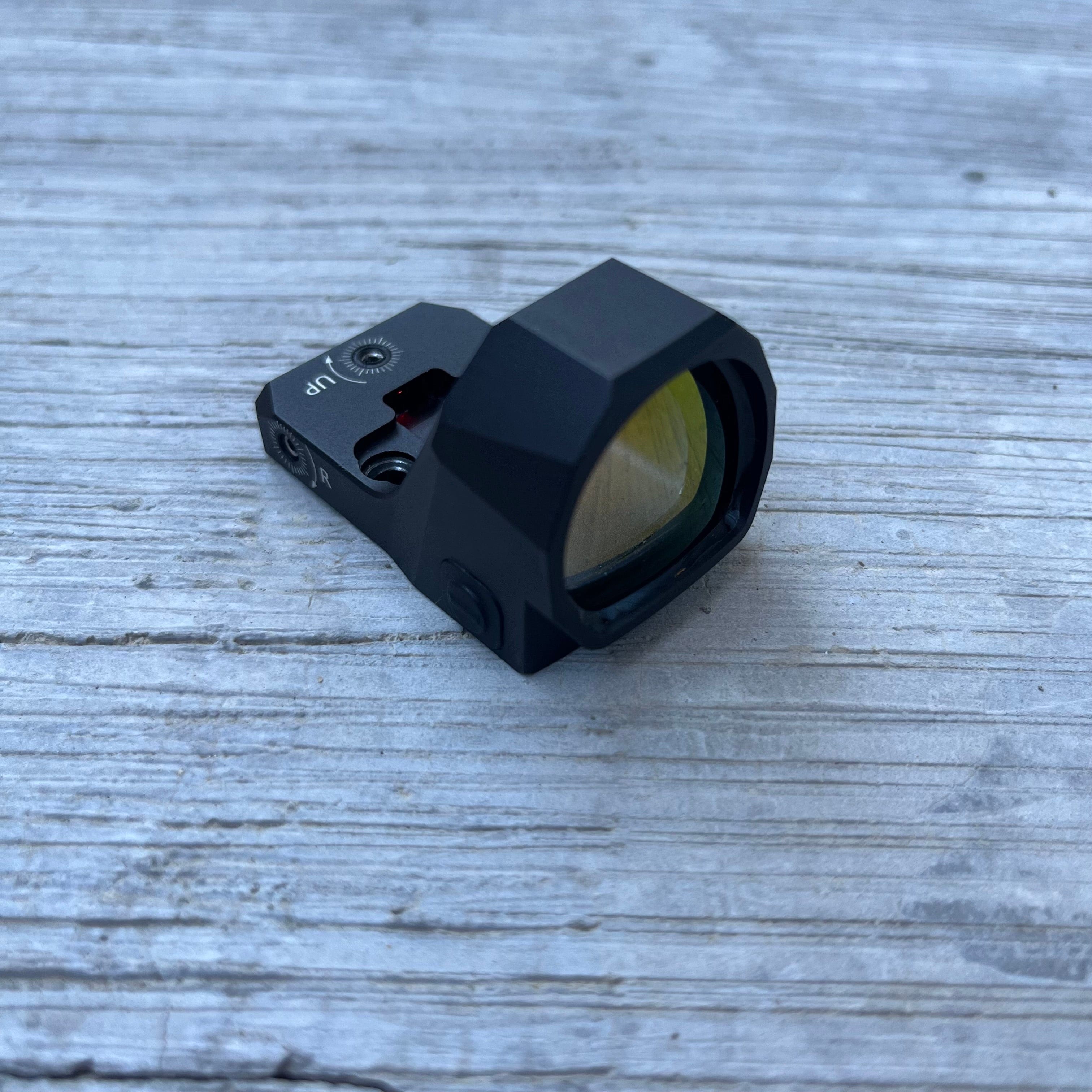 SFT2 Tactical Regulator MRS red dot sight with clear lens and adjustable settings on a firearm mount.