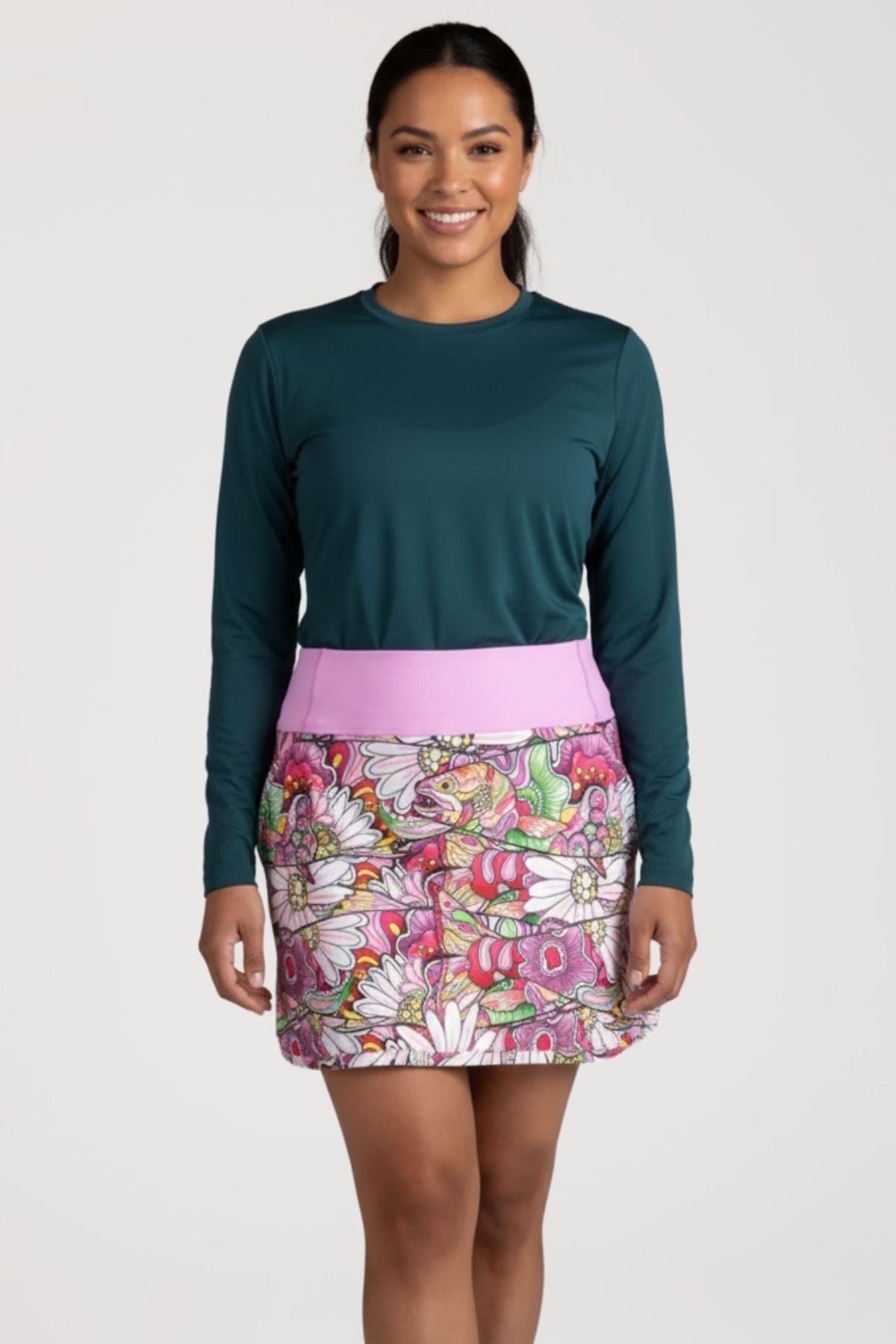 Red FisheWear REDtro Salmon Skort featuring a sporty skirt design with built-in shorts, in vibrant red fabric.